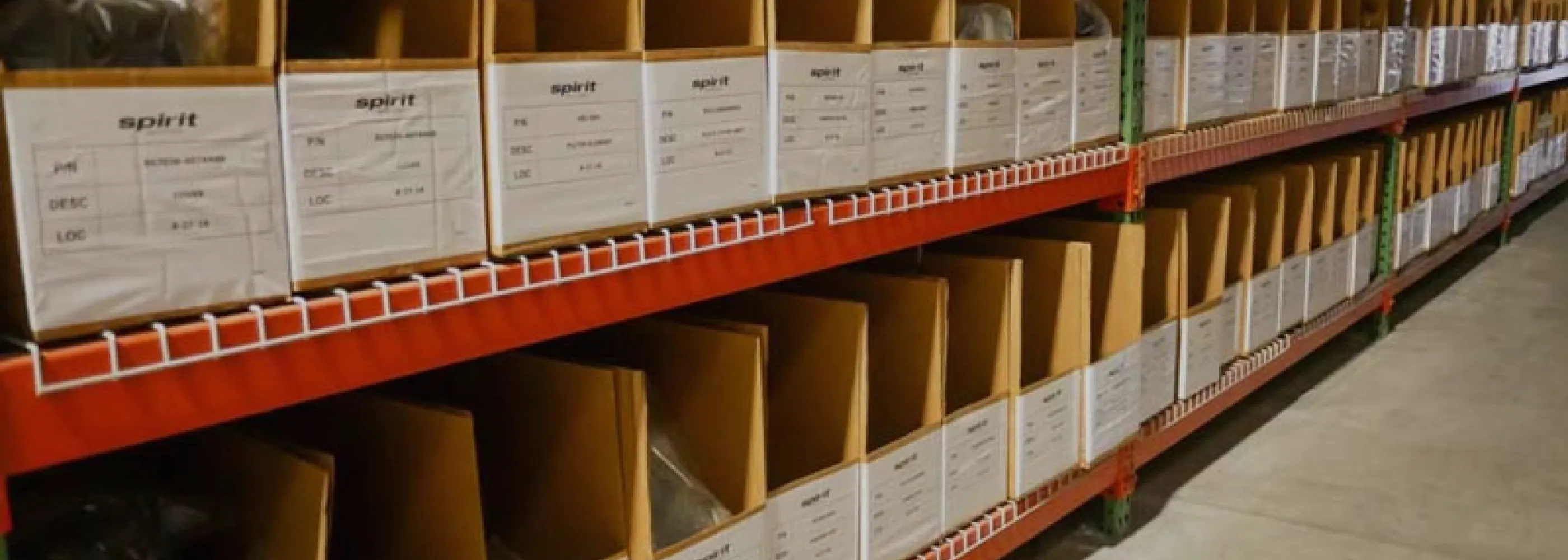 Warehouse shelves stocked with boxed inventory
